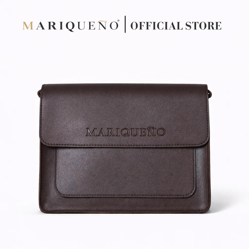 Walnut brown leather clutch bag with 'Mariqueno' branding on a white background
#color_walnut
