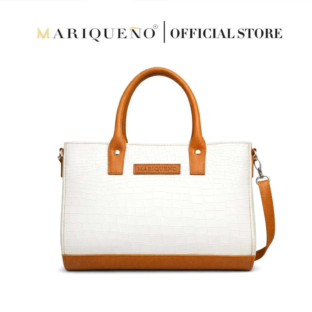 White handbag with brown accents and 'Mariqueno' branding on a white background
#color_off white