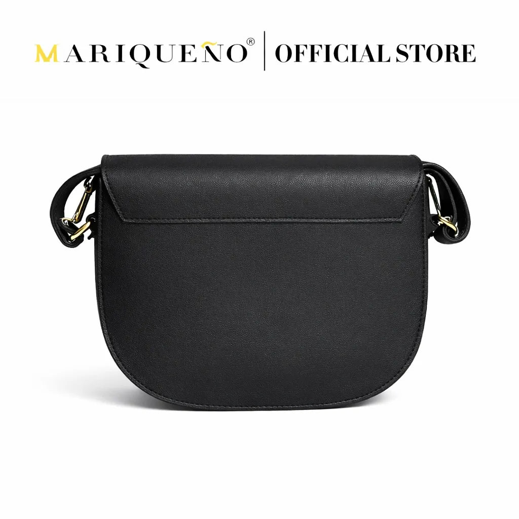 Black sling bag on a white background, featuring the Mariqueno brand.
#color_black