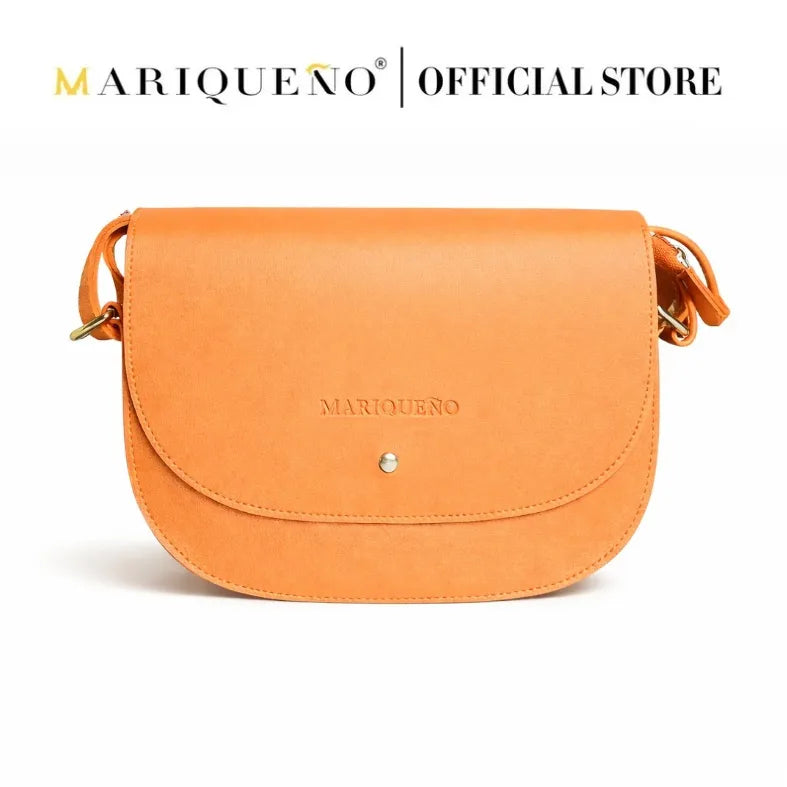 Brown shoulder bag with 'Mariqueno' branding on a white background
#color_tan brown