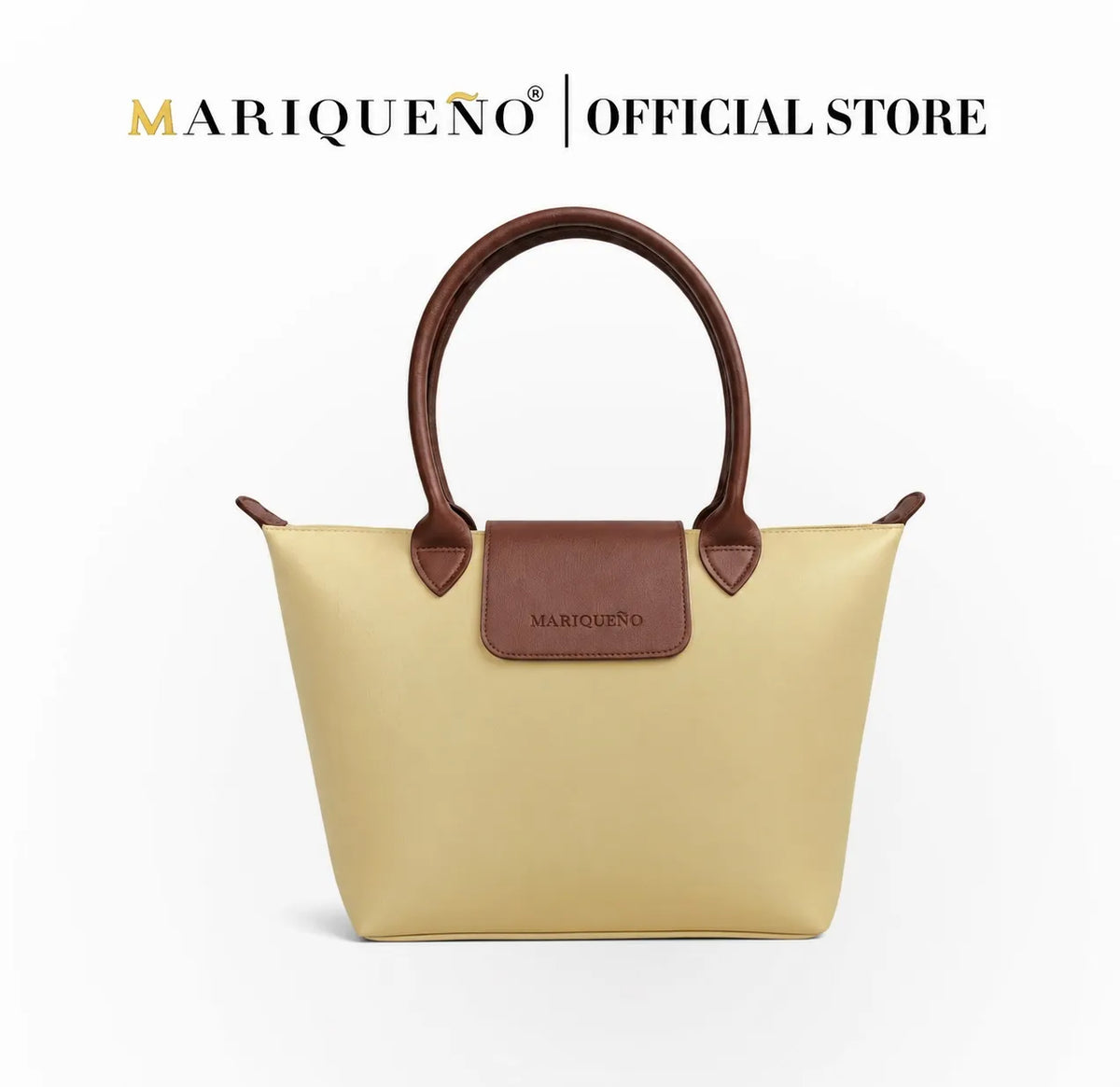 Cream handbag with brown handles and accents, featuring Marqueéno branding on a white background.
#color_cream
