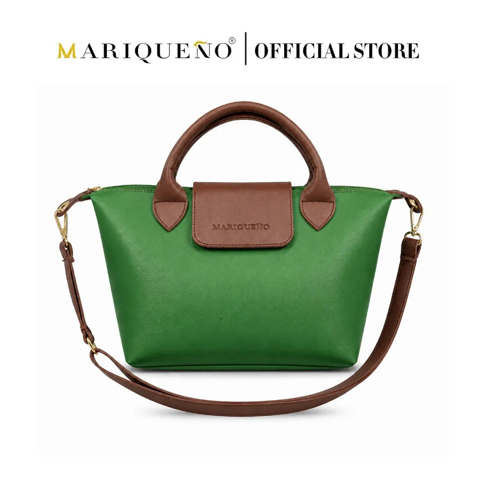 Green handbag with brown handles and strap on a white background, featuring the Mariqueno brand.
#color_emerald green