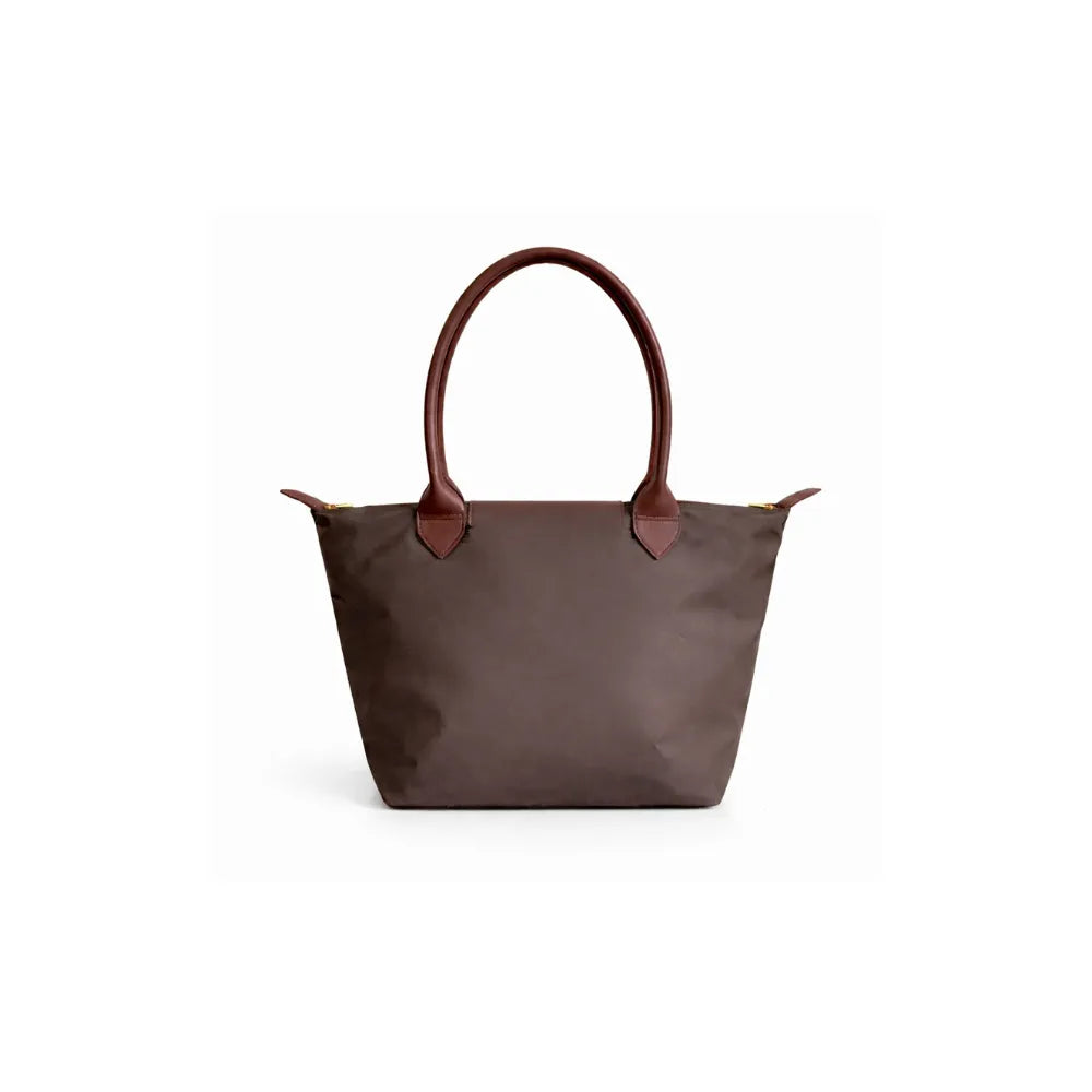 Brown tote bag with leather handles on a white background
#color_choco brown
