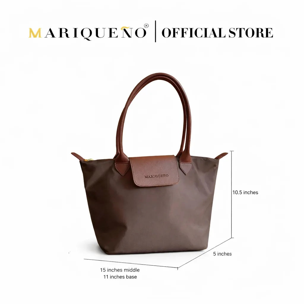 Brown handbag with leather handles and a visible brand logo on a white background
#color_choco brown