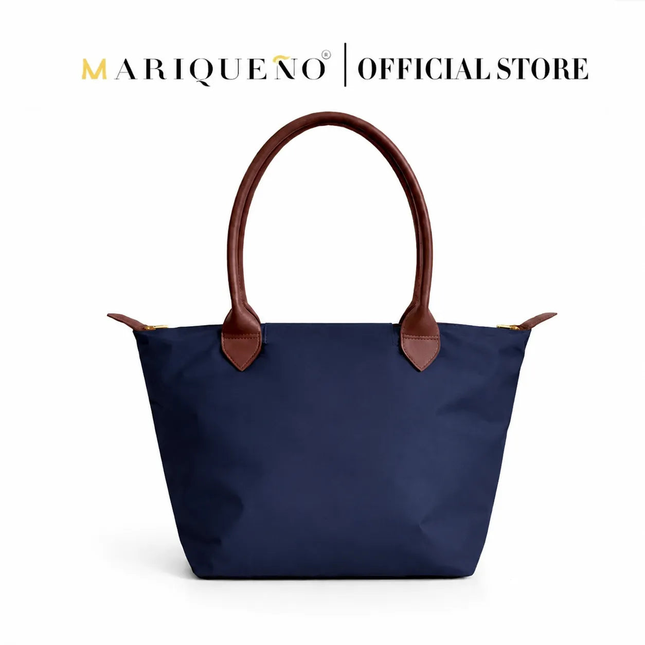 Navy blue handbag with brown handles on a white background, featuring the Mariqueño brand.
#color_navy blue