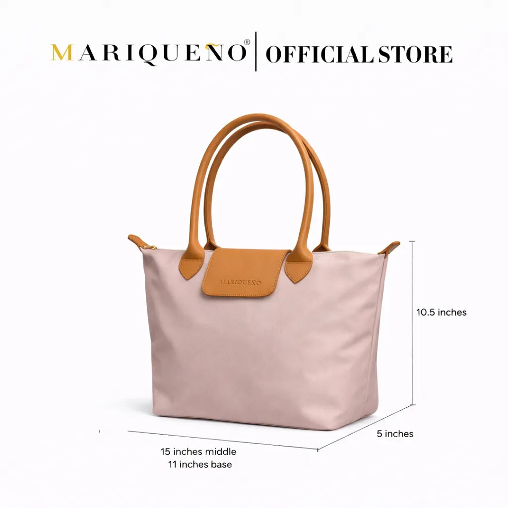 Taupe handbag with brown handles and a patch, displayed with dimensions on a white background, branded as Mariqueno.
#color_taupe