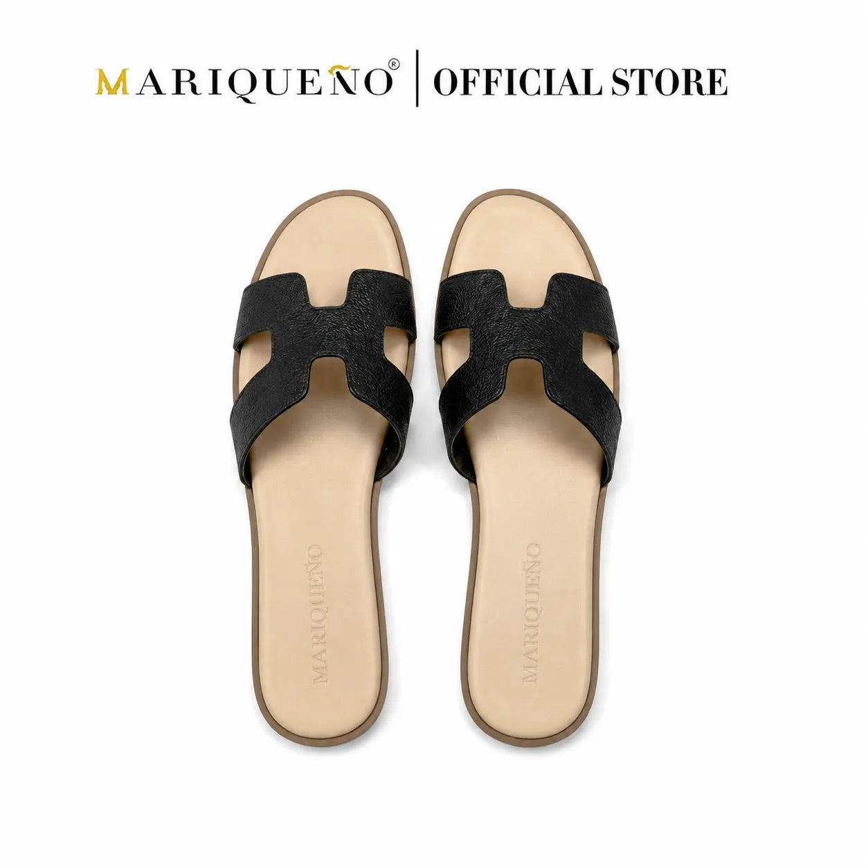 A pair of Mariqueno H-shaped slide sandals in black textured leather with beige insoles, shown from a top-down view on a white background with the 'Mariqueno | Official Store' logo at the top.
#color_black