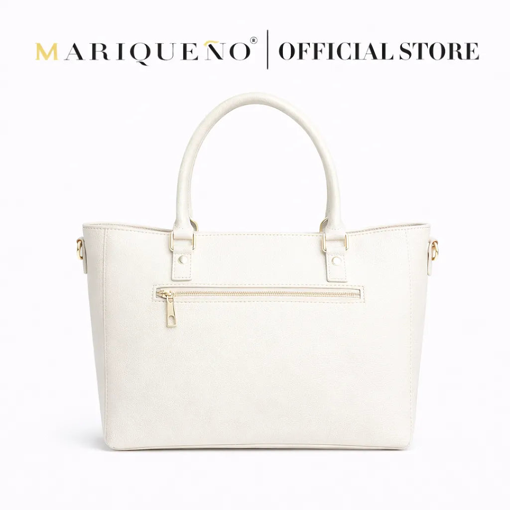 White handbag with gold accents on a white background, featuring the Marique No logo.
#color_off white