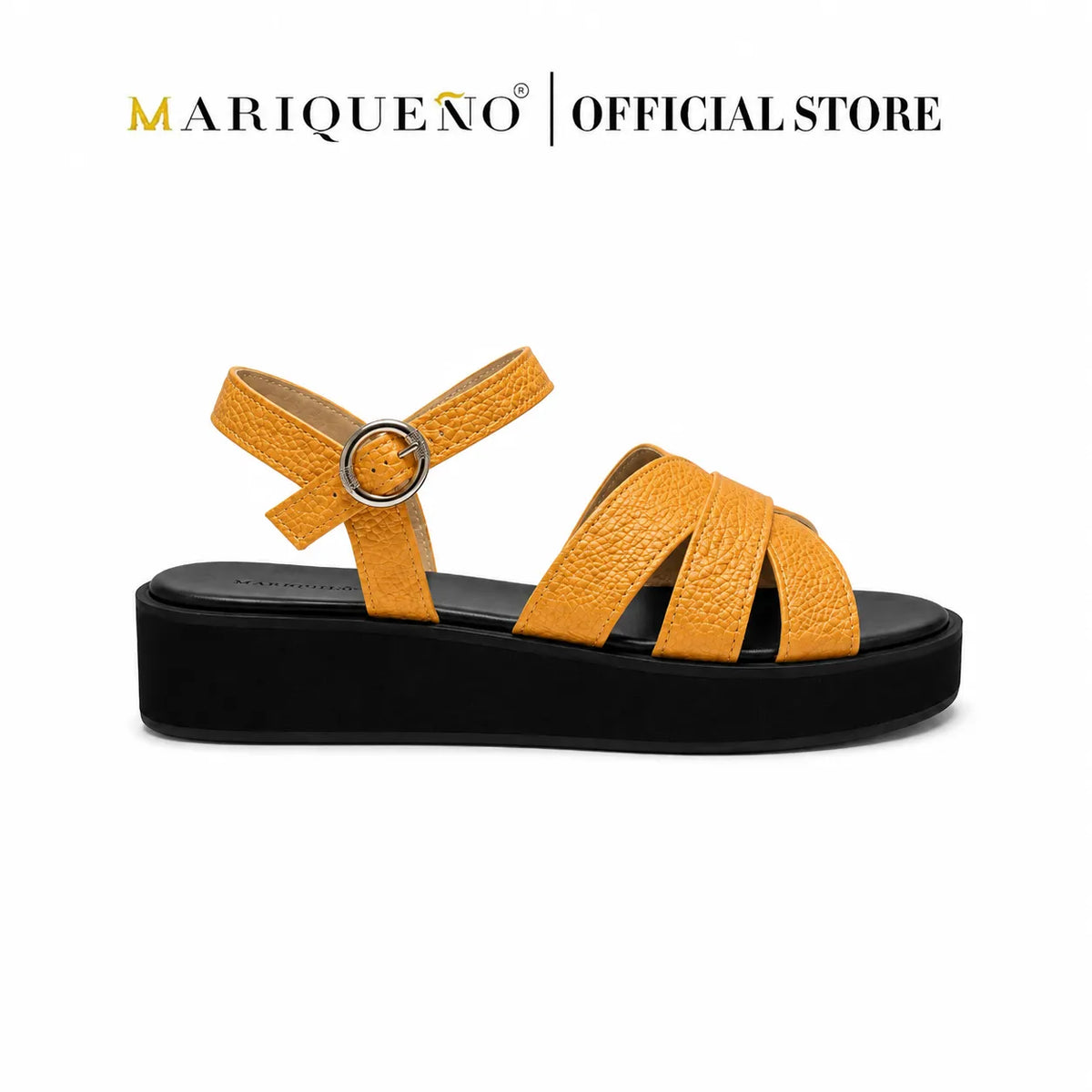 A single Mariqueno platform sandal with textured tan straps and a black platform sole, shown against a plain white background with the brand name 'MARIQUENO | OFFICIAL STORE' at the top.
#color_tan