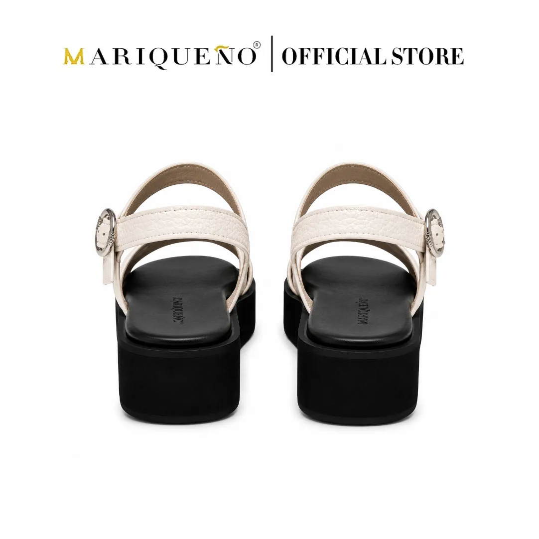 A pair of Mariqueno platform sandals shown from the back, featuring off-white straps with silver buckle details and black platform soles, set against a plain white background with the brand name 'MARIQUENO | OFFICIAL STORE' at the top.
#color_white