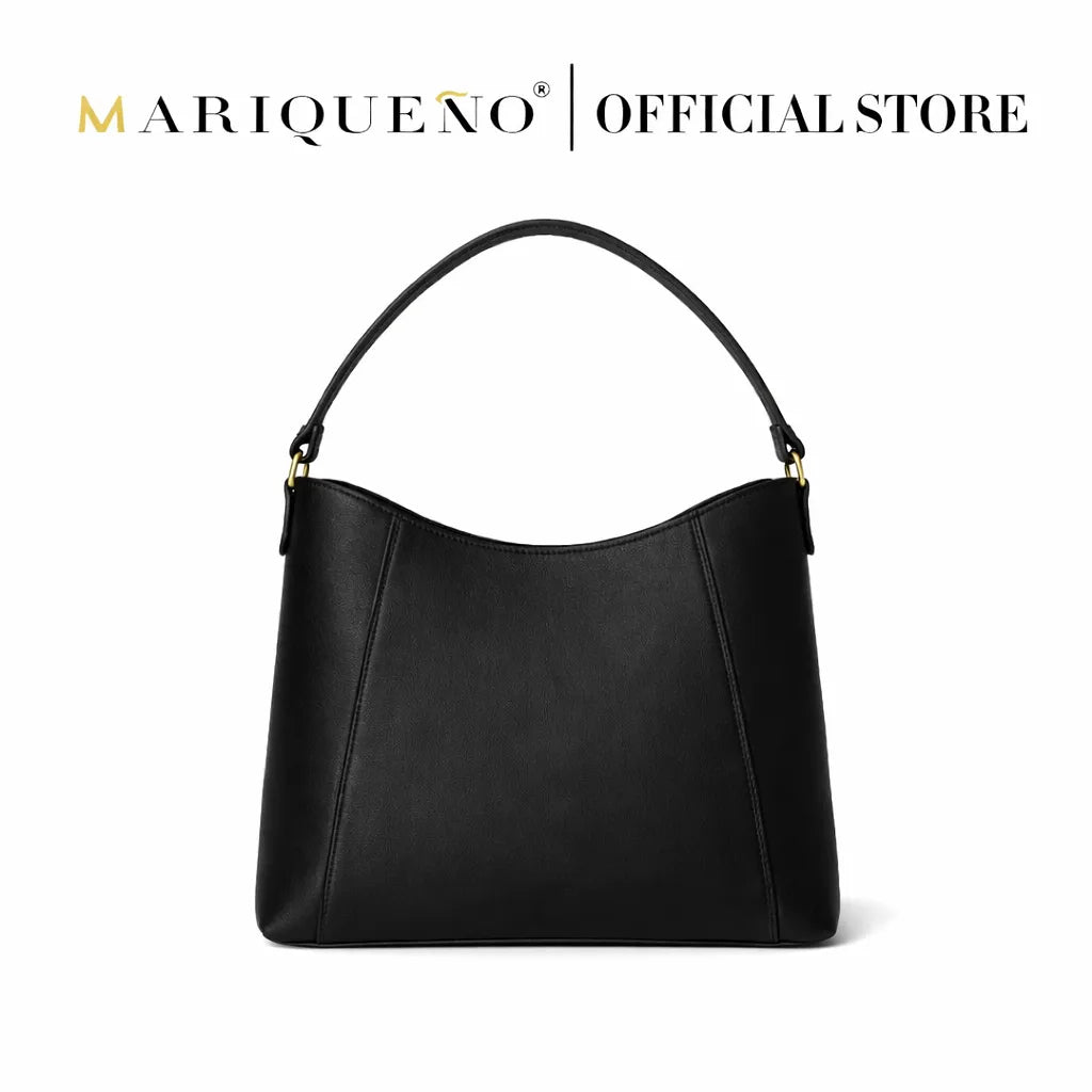 Black handbag with gold hardware on a white background, featuring the Mariqueño brand.
#color_black