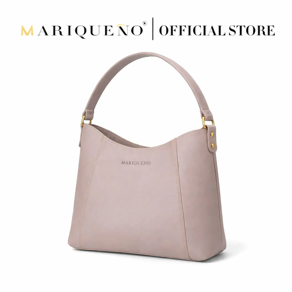 Taupe handbag with 'Mariqueno' branding on a white background
#color_taupe