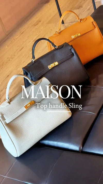 3 top handle bags in colors cream, black and tan.