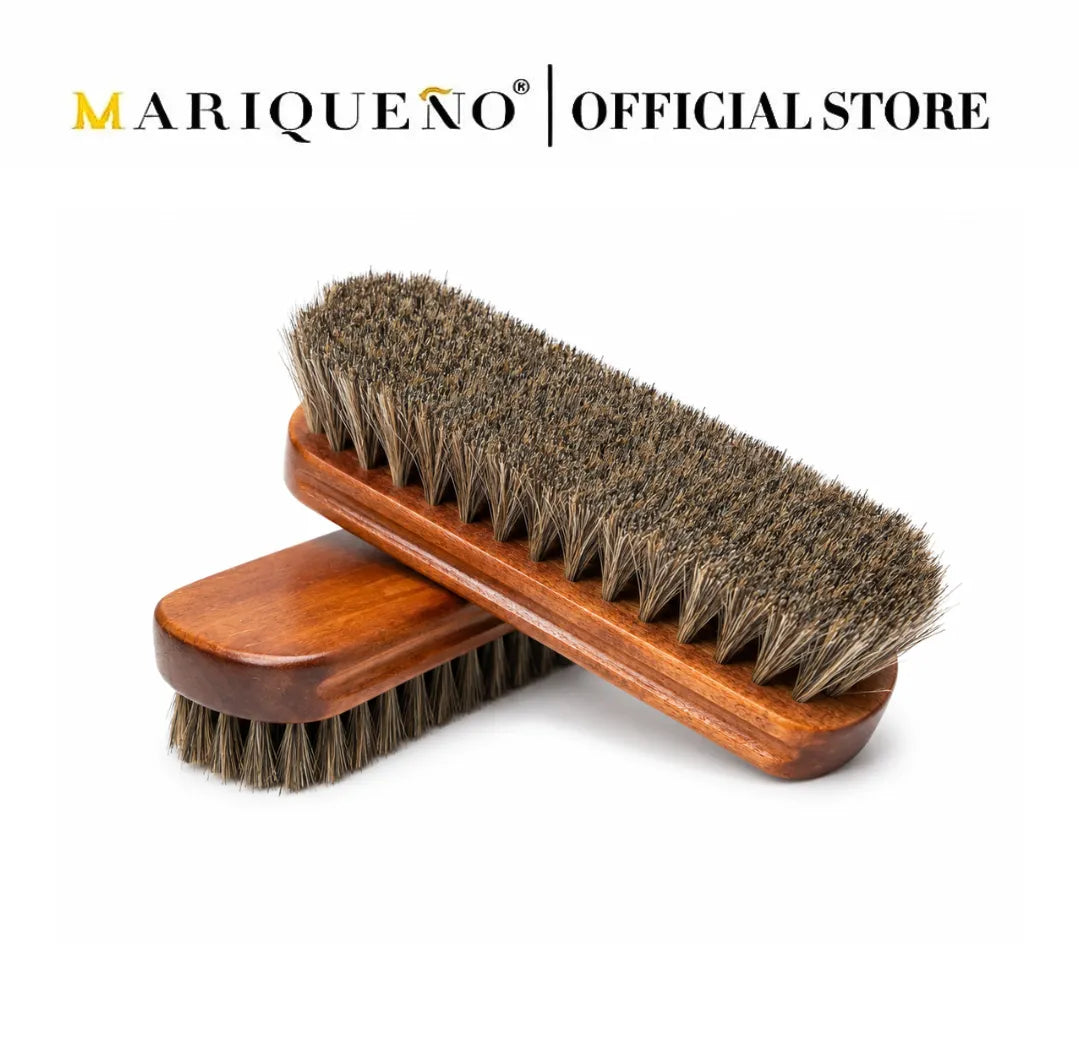 Wooden brush with bristles on a white background, branded as Mariqueno Official Store.
